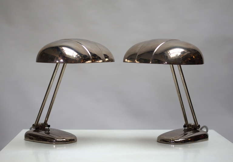 Modernistic table lamp by the Czech architect Siegfried Giedion. Produced by BAG Turgi, Switzerland, 1930s.

These table lamps are designed by Siegfried Giedion for BAG Turgi in the 1930s. It is made from steel and chrome. Fully chromed and in