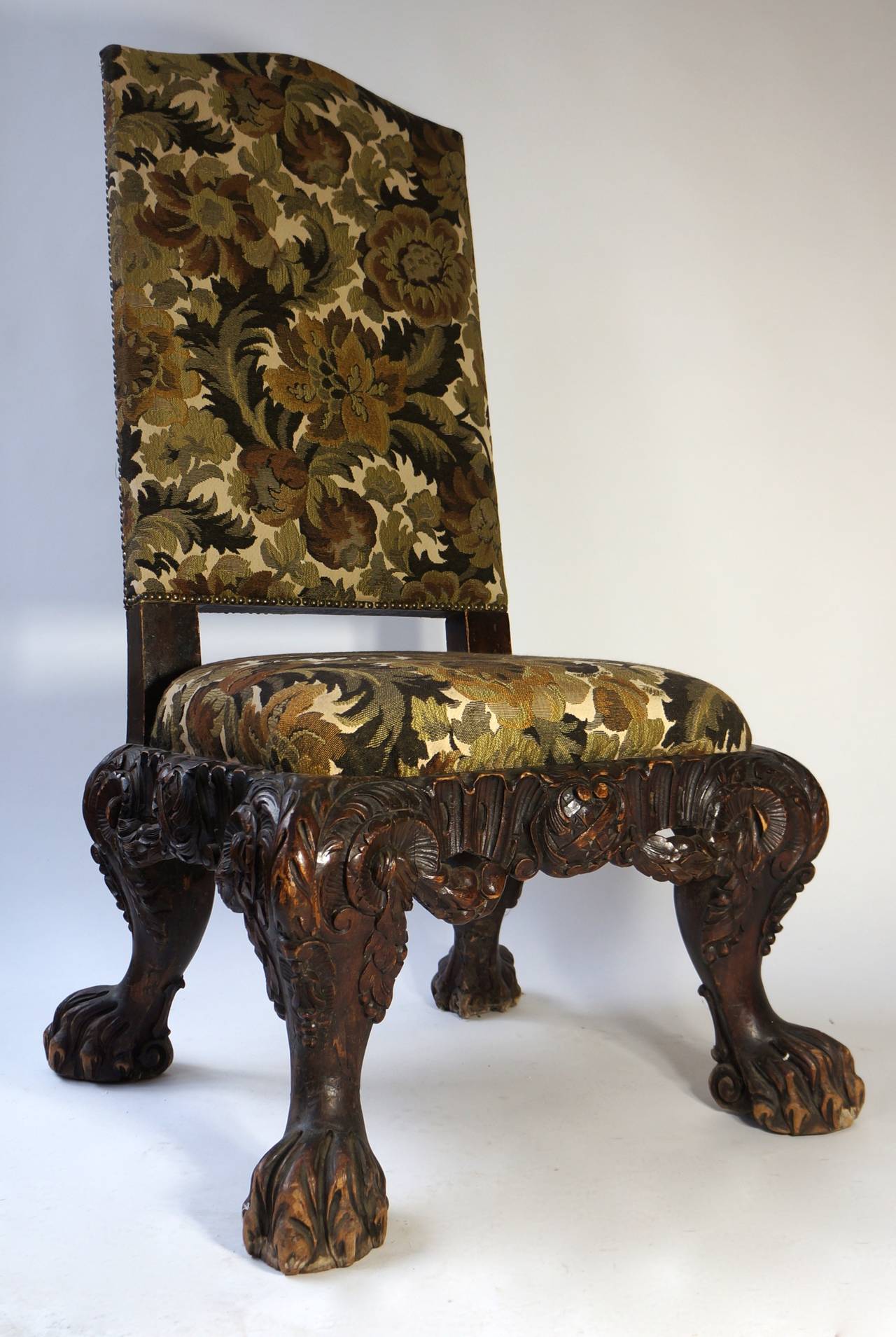 Italian carved barok style chair with claw feet.