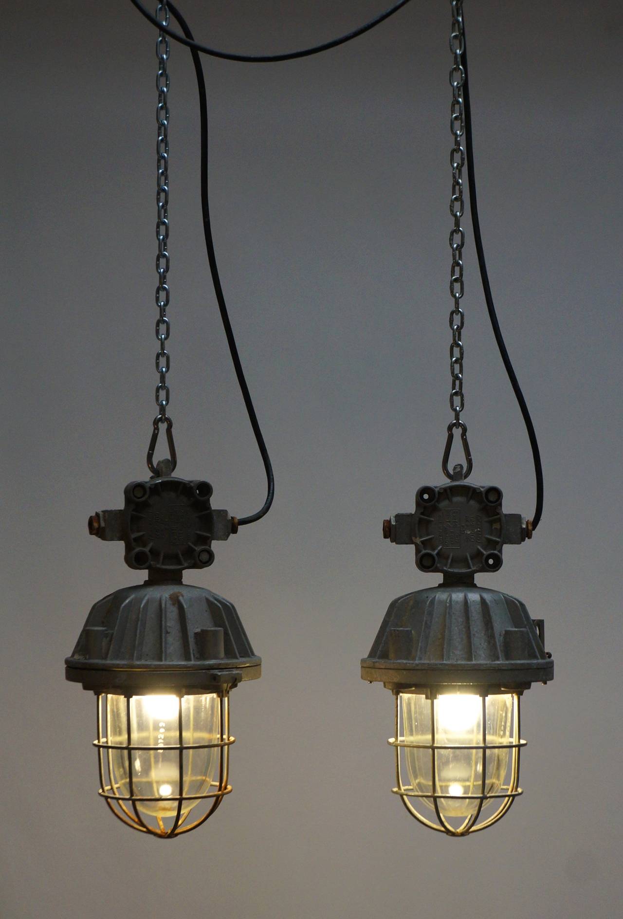 Substantial pair of vintage nautical or Industrial metal bulkhead lights.
