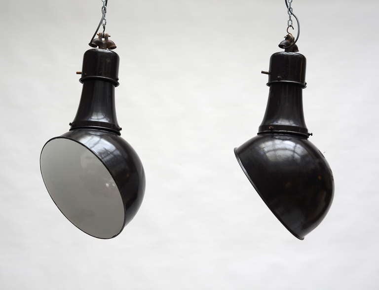 Mid-Century Modern Pair of Black Industrial Hanging Lamps For Sale