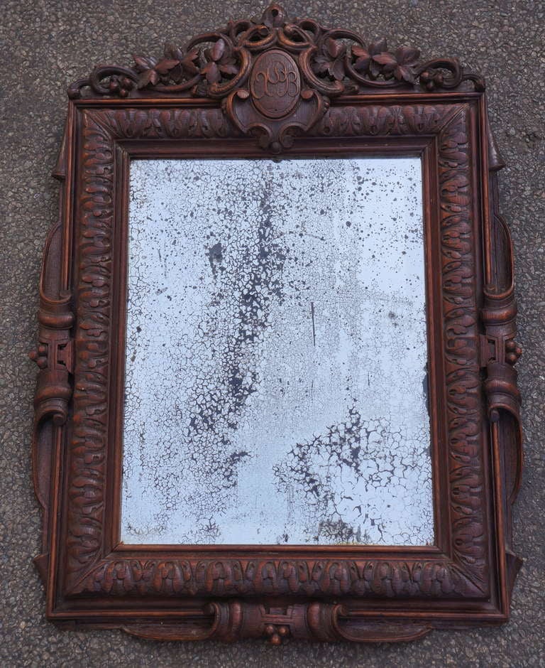 Hand-carved wooden mirror.