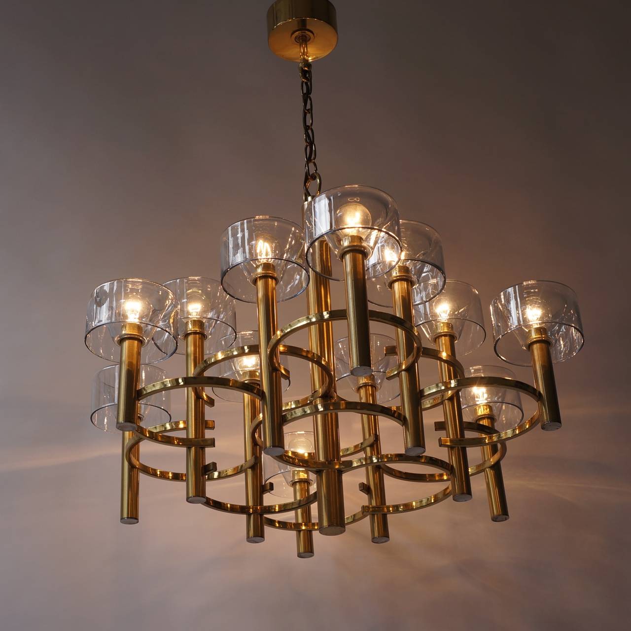 Large Gaetano Sciolari chandelier with brass and glass tubes.
Total height 90 cm.
12 bulbs.