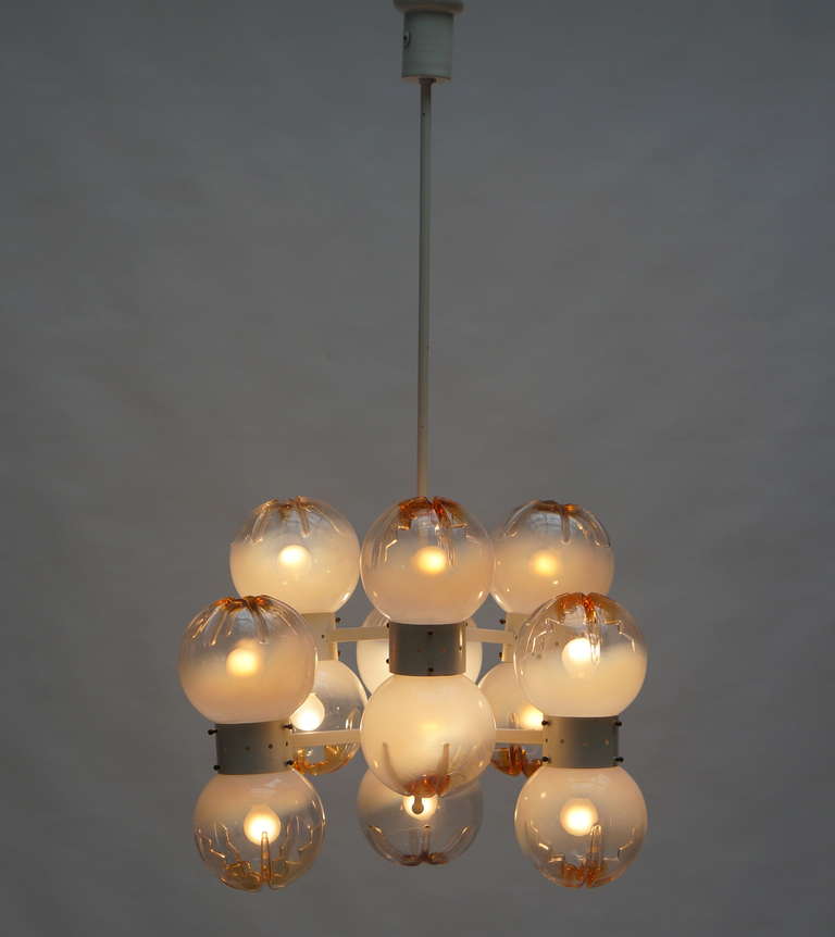 Italian AV. Mazzega Murano Glass chandelier with 12 glass globes.
Measures: 
Diameter 60 cm,
height 110 cm.