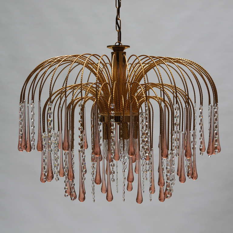 Crystal chandelier featuring teardrop glass, Murano Italy. 
Measures: Diameter: 70 cm.
Height: 50 cm.
Total height: 90 cm.