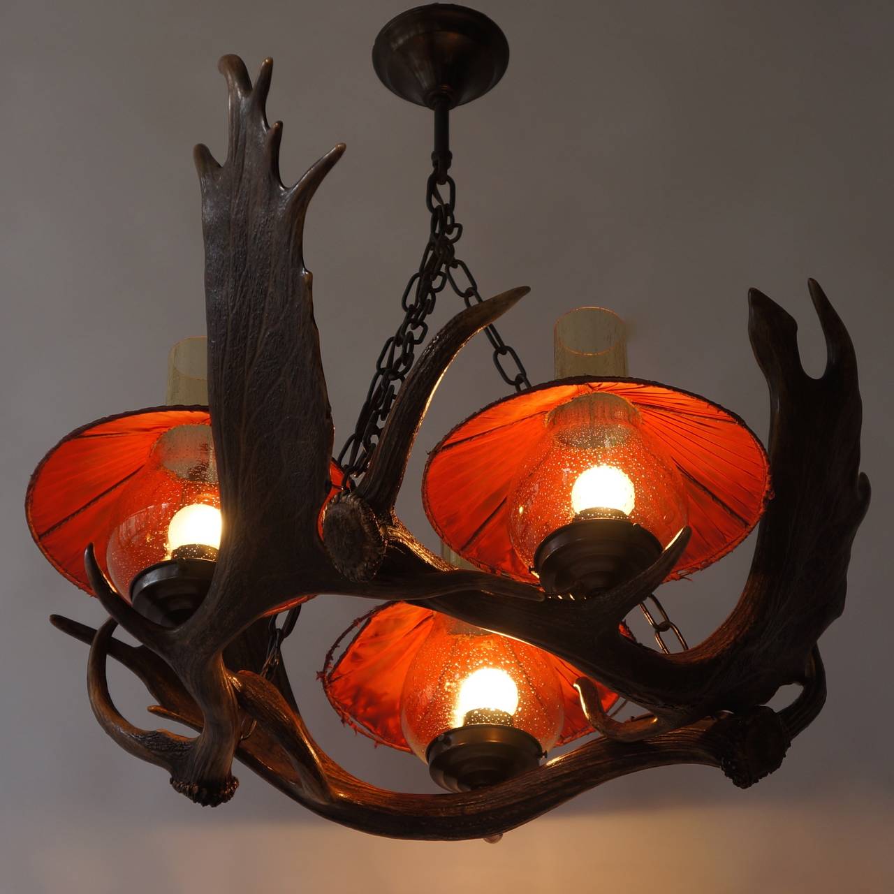 Antler three lights chandelier, Italy, circa 1940s.
The lampshade are worn but beautiful.