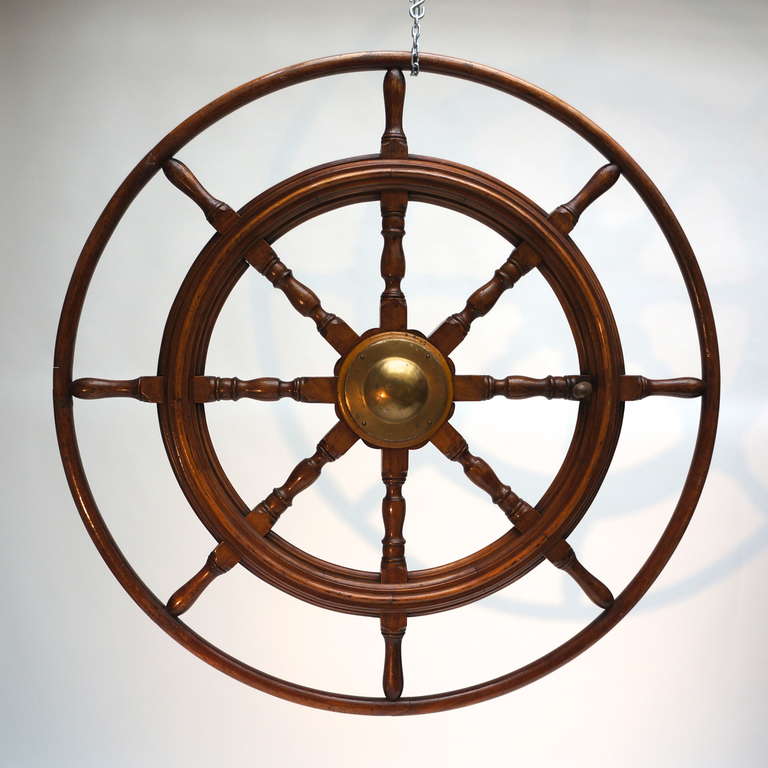 Antique boat steering wheel.