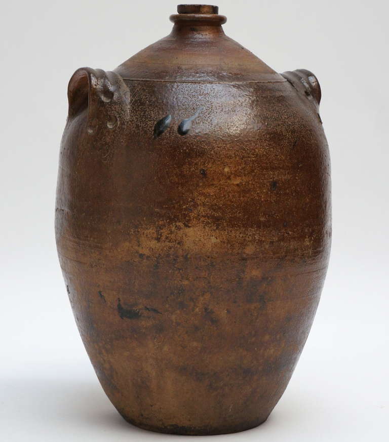 A glazed stoneware jug.