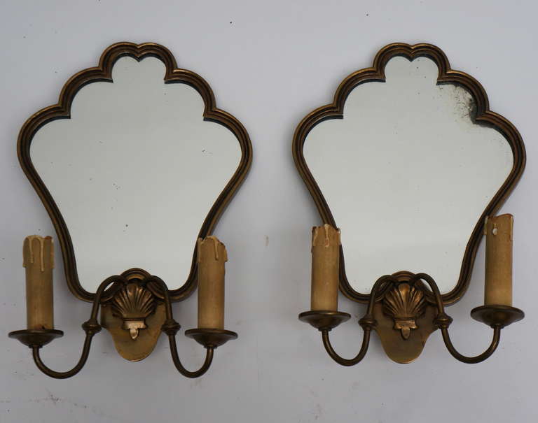 A pair of wall lights or sconces.