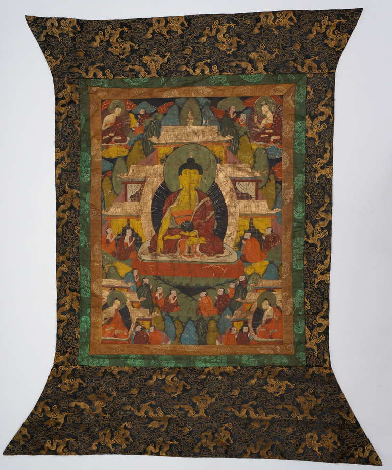 Antique Tibetan Thangka of Gautama Buddha with Silk Brocade Mount, ca. 1900