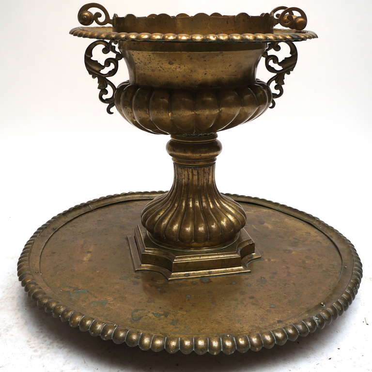 Hand-hammered copper baptismal font, Belgium 19th century. Chalice shape. Makes a great planter.
This handmade baptismal font has a long and distinguished history. It is made in Belgium at the beginning of the 20th century, and moved to Congo, at