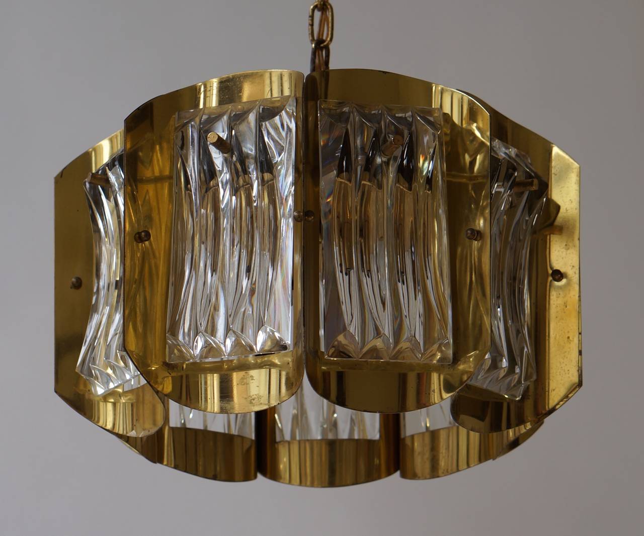 A Murano glass chandelier. 
Brass hardware. Size given if for fixture only (chain and canopy extra 100 cm). Chandelier has four light sockets.