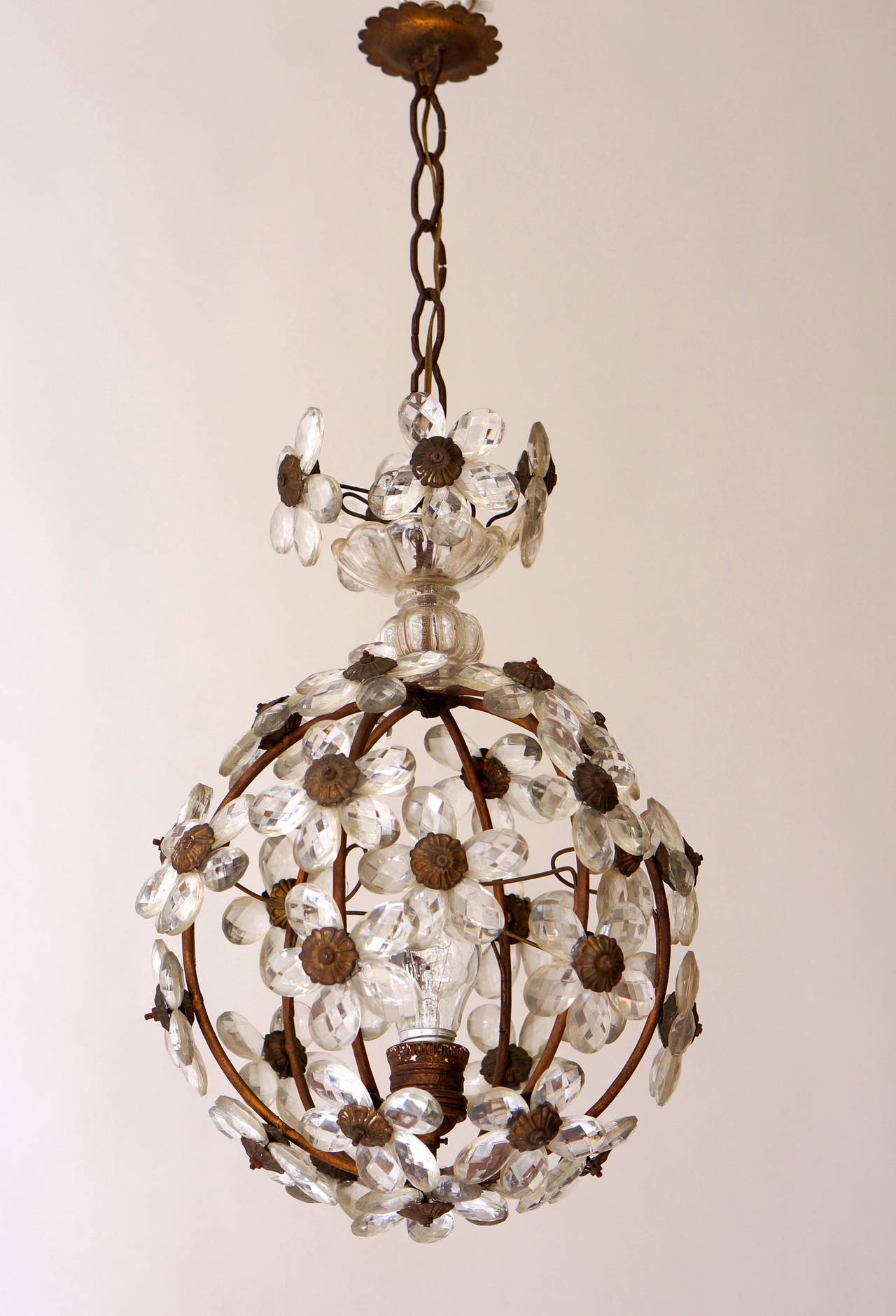 Murano brass and glass Flower ball chandelier.
Circa 1930s.