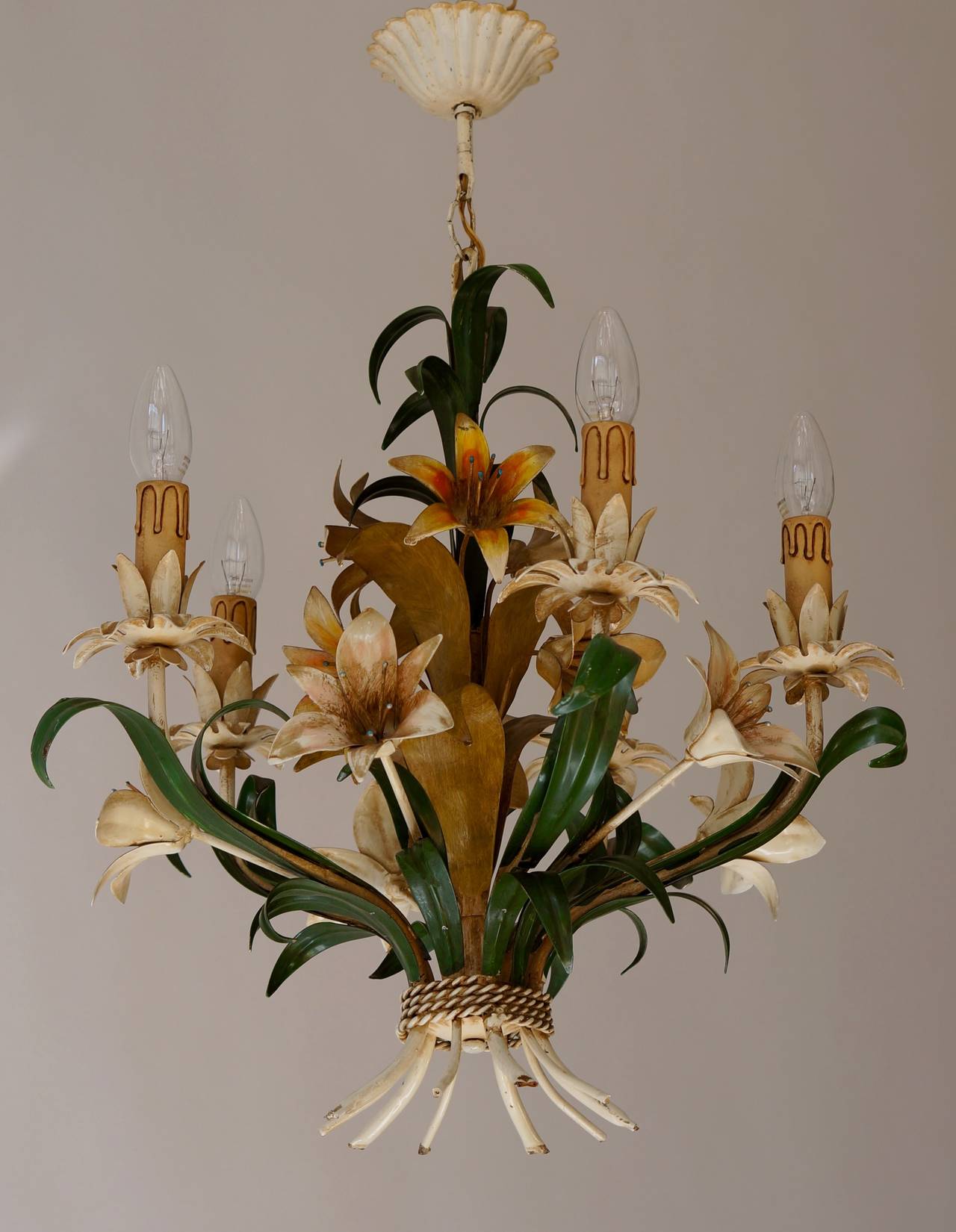 Two Italian tole flower polychrome chandeliers.