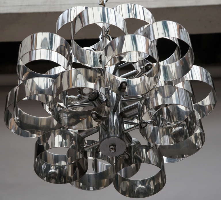 A vintage Italian chandelier by Sciolari with a sculptural chrome frame.