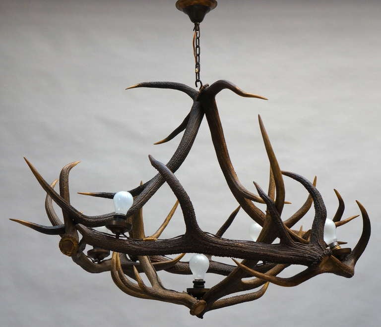 Gorgeous vintage French five-light authentic antler chandelier. This awesome chandelier would be fantastic in most any room of the home.
