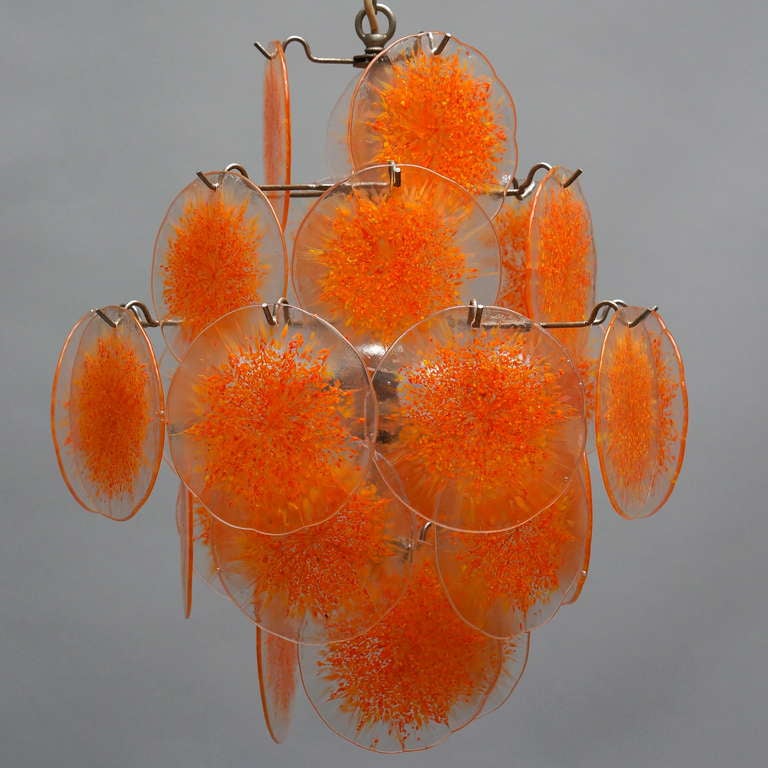 Murano Vistosi chandelier with 27 orange discs.