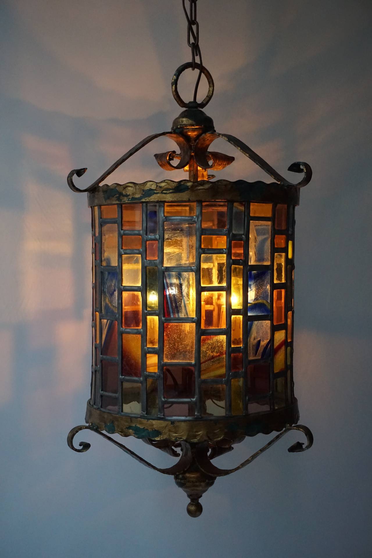 Beautiful monumental stained glass lantern.
Diameter from the cylinder is 38 cm and height 43 cm.
Total height with the chain is 175 cm.