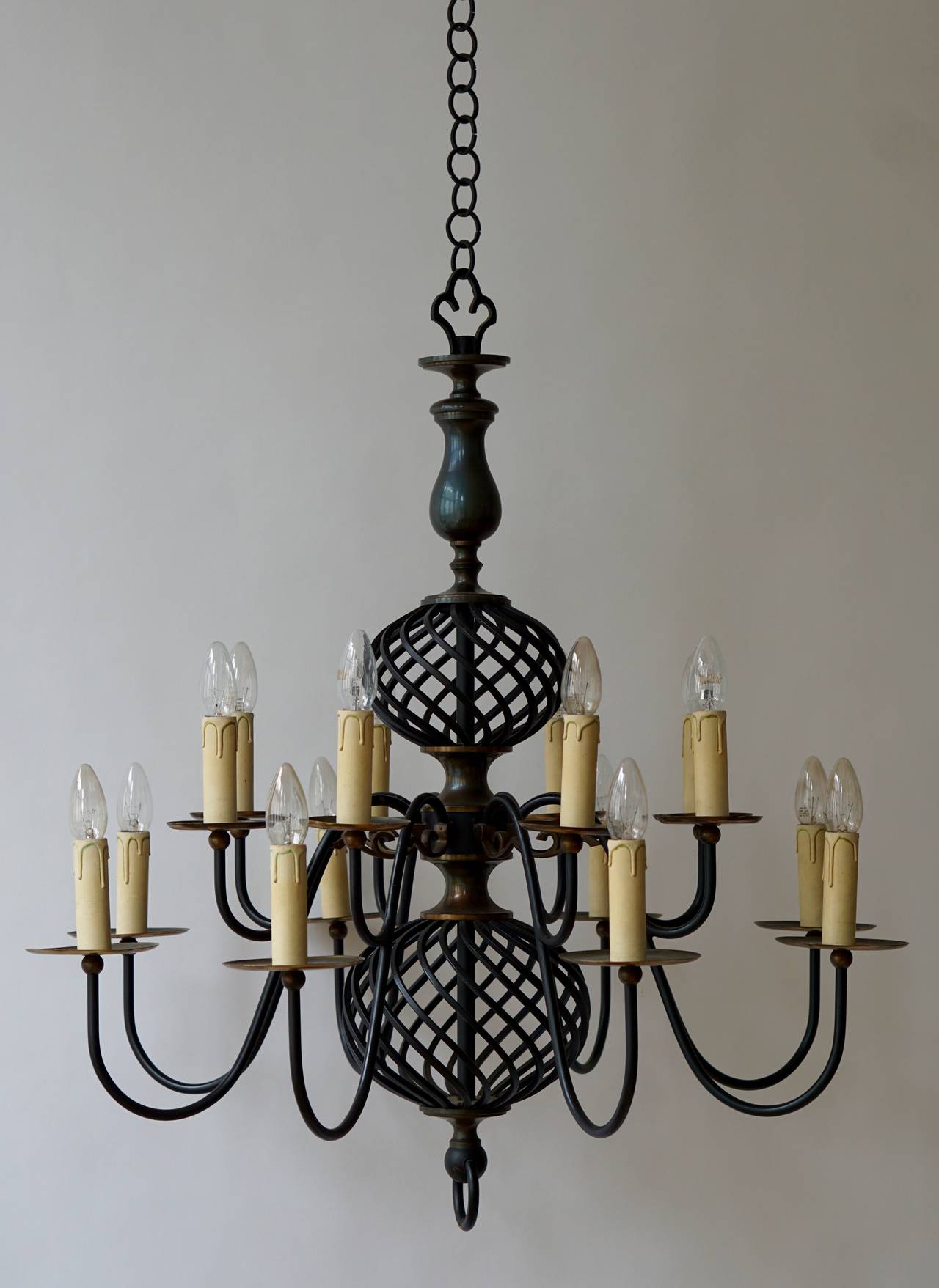 Original Midcentury chandelier from France, 1950s.
Body of solid wrought iron.

Diameter 33