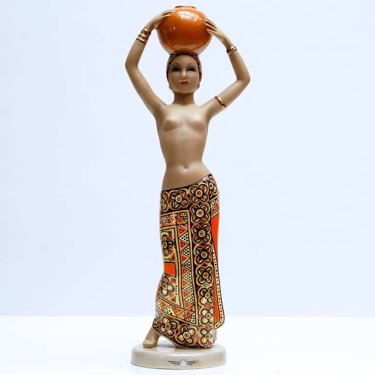 Very stunning large Art Deco Statue by Cia Manna, Torino, Italy.
C.I.A. Manna Torino Lenci Nel Palmeto ceramic sculpture. Semi nude form of young woman. Worked for Lenci Ceramic Studios in Torino Italy.
Height:56 cm.
Diameter:20 cm.