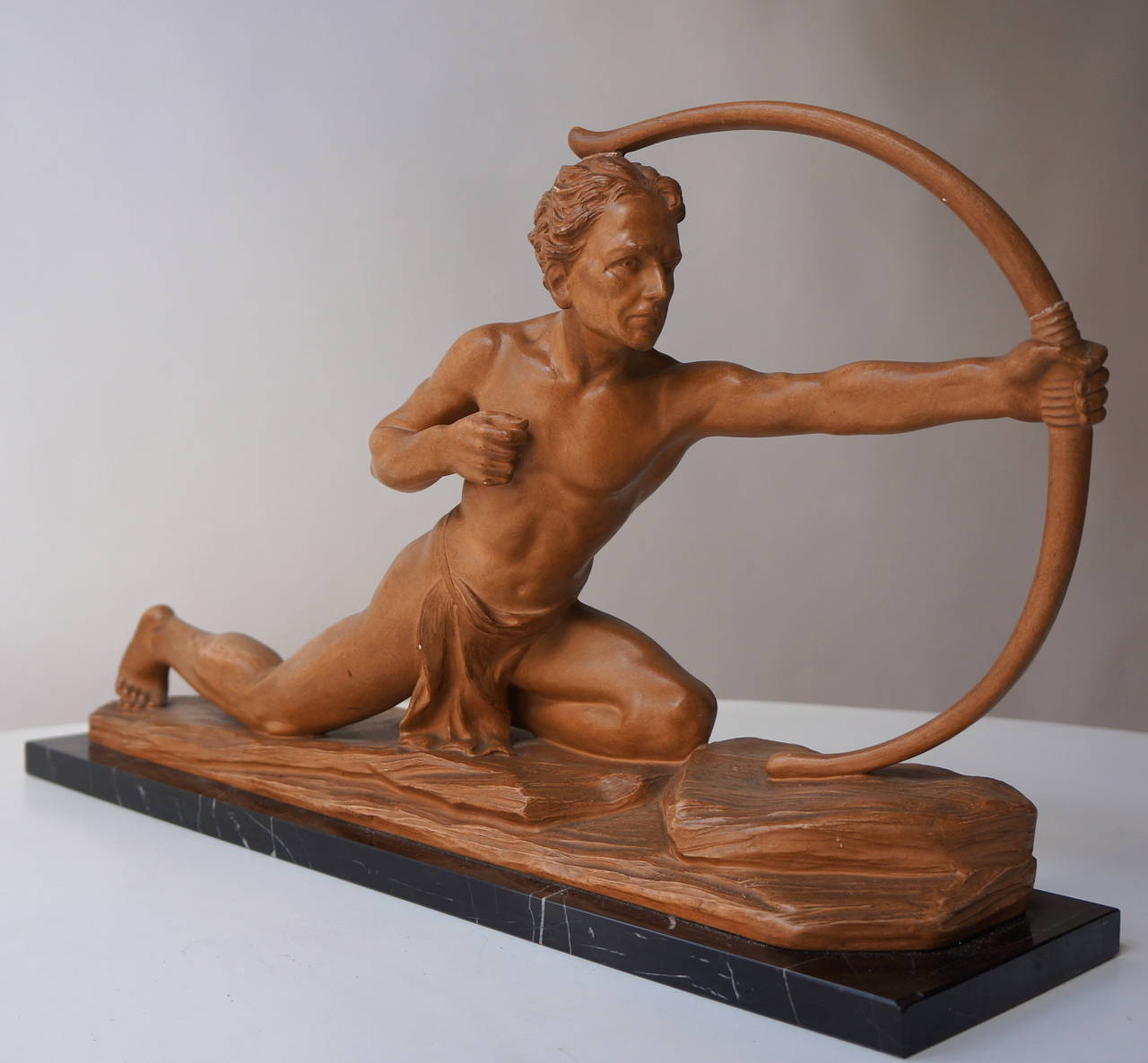 An expressive and awesome Belgian terracotta sculpture, signed J. Dommisse and stamped.