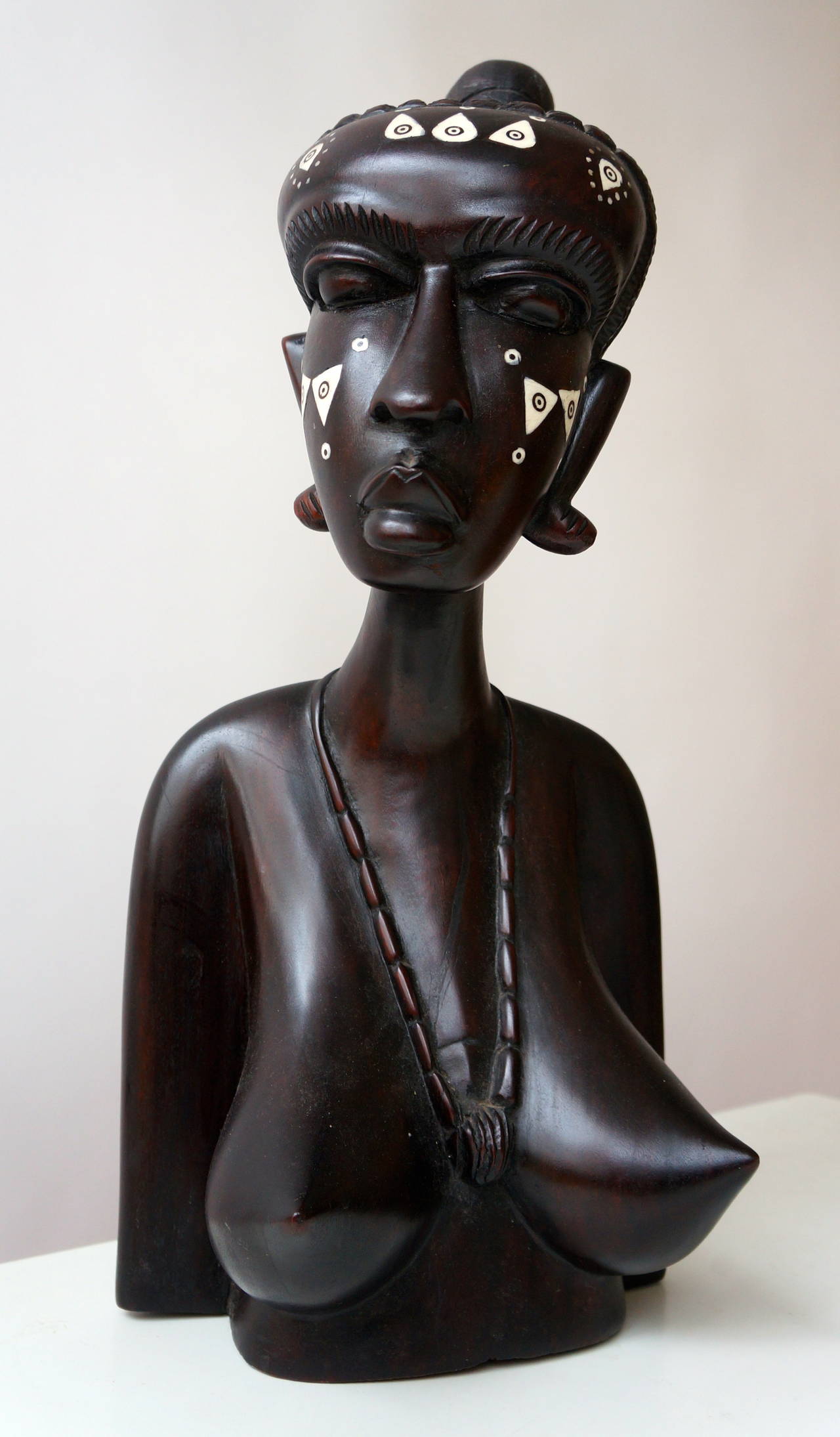 carved african wooden busts