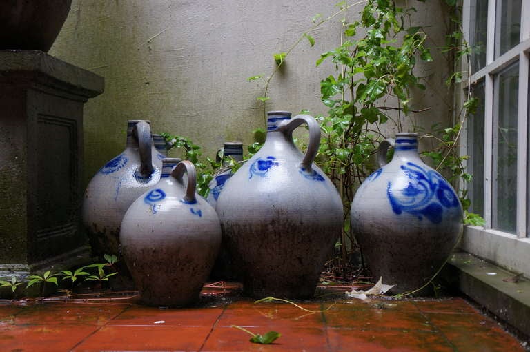 Industrial Collection of Six Salt Glazed Stoneware Jugs For Sale