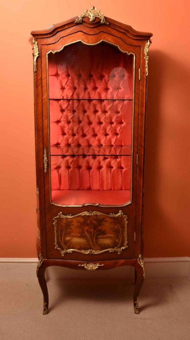 This is a beautiful Antique French Vernis Martin kingwood display cabinet in the Louis XV manner, from the first quarter of the 20th century. 

The cabinet has beautiful hand painted decoration and is embellished with exquisite ormolu mounts, the