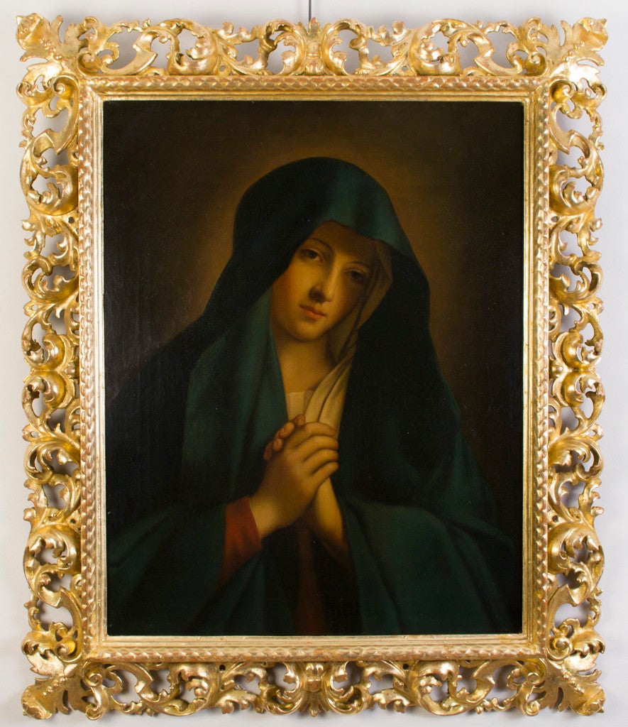 This is a beautiful oil on canvas painting 'The Madonna in Sorrow' by Angiolo Cherici, circa 1850 in date. 

It is a devotional work painted in the mid 19th century by Angiolo Cherici who was a follower of 