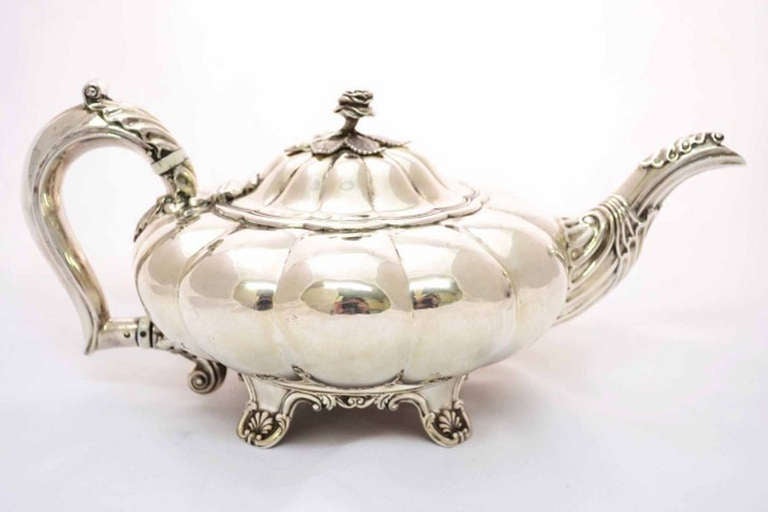 A wonderful sterling silver antique teapot with hallmarks for London 1827 and the makers mark of Joseph Angel.

It is beautifully made and there is no mistaking its unique quality and elegant design, which is sure to make it a treasured piece by