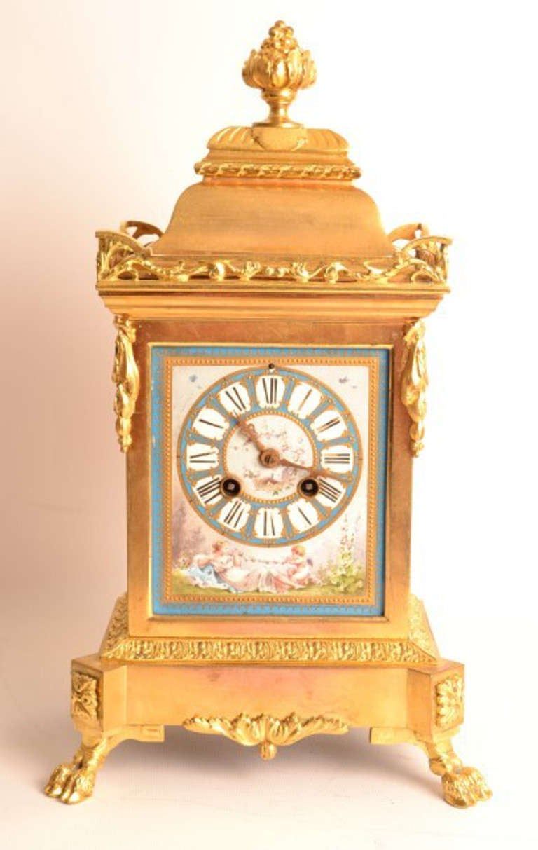 This is a very attractive antique French ormolu mantel clock with a profusion of blue porcelain panels in the Sevres manner, and circa 1860 in date. The movement is stamped R.C which is attributed to Richard & Cie.
The serial Number: 1425.

The
