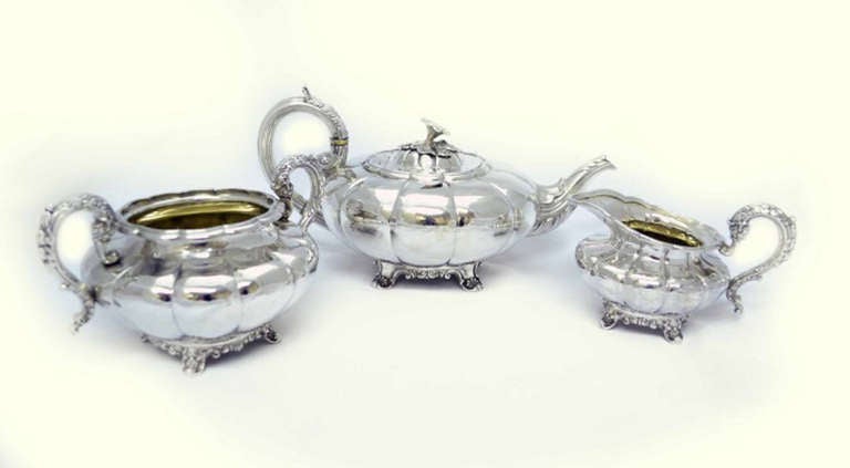 This is a rare and exquisite English William IV antique sterling silver three piece tea set with hallmarks for Birmingham 1836 and the makers mark of G.R.Collis.

Condition:

In excellent condition with no dings or dents.

Dimensions in