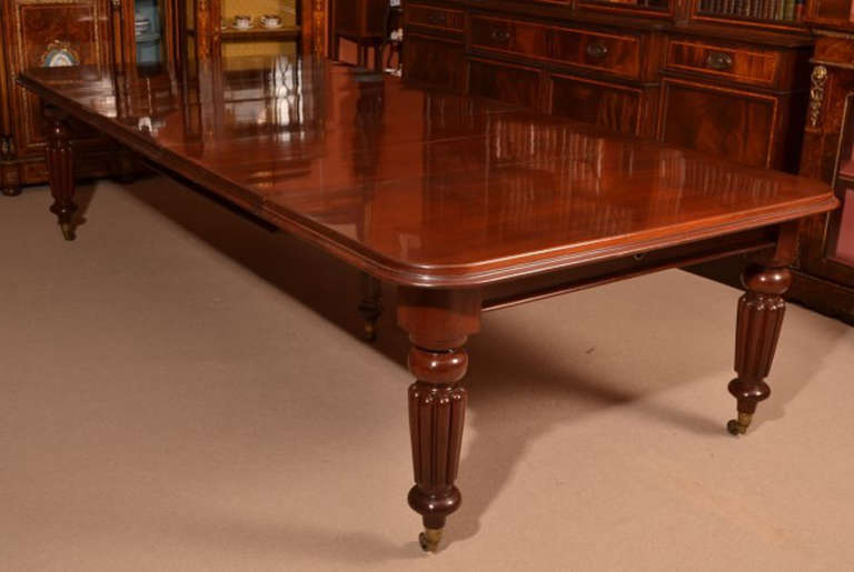 This is a fantastic antique early Victorian dining table, bought on my last buying trip to Devon, offered with a set of twelve matching balloon back chairs.

This amazing table has four original leaves and can seat twelve people in comfort. It has