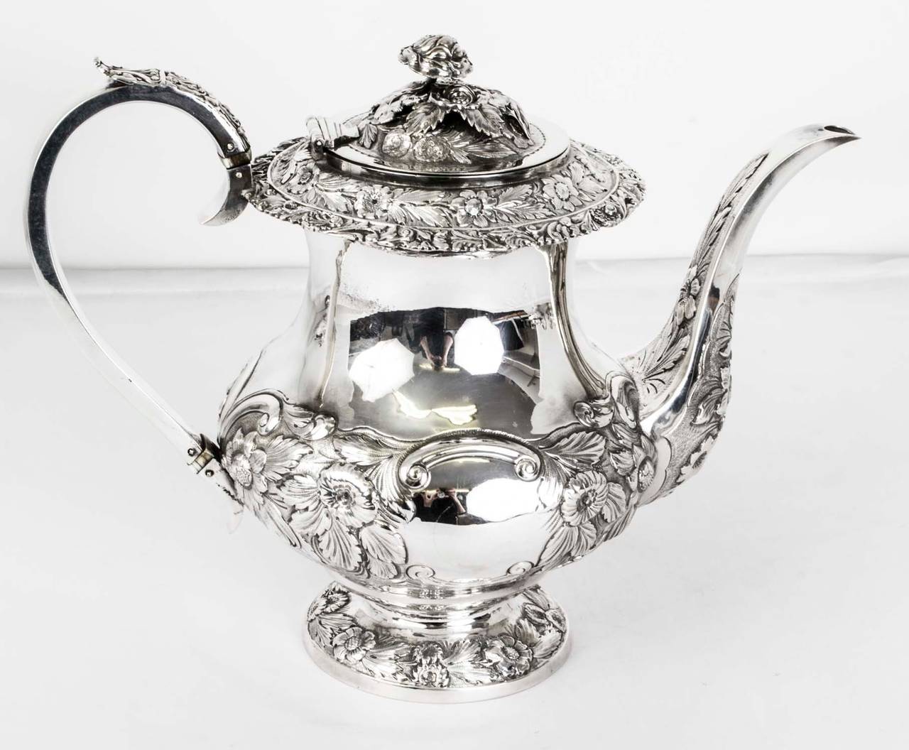 This is a beautiful antique William IV four piece sterling silver tea and coffee set with the makers mark of the celebrated silversmith Jonathan Hayne and hallmarks for London 1831. 

The whole set is beautifully embossed with floral decorations.