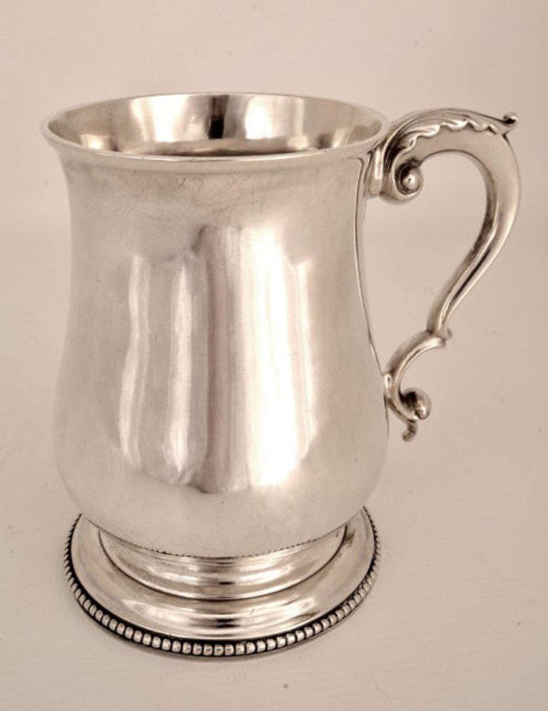 This is another wonderful antique English silver baluster shaped mug by the celebrated silversmith Hester Bateman. It bears the hallmarks for London 1761 and the maker's mark of Hester Bateman.

This mug is beautiful in its simplicity.

It is