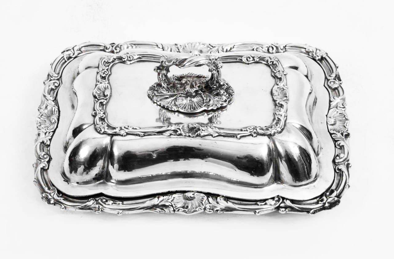 This is a wonderful English antique sterling silver entree dish by the world famous and celebrated silversmith Paul Storr. 

It has hallmarks for London 1828 and the makers mark of Paul Storr. 

The dish has floral decoration around the rim as