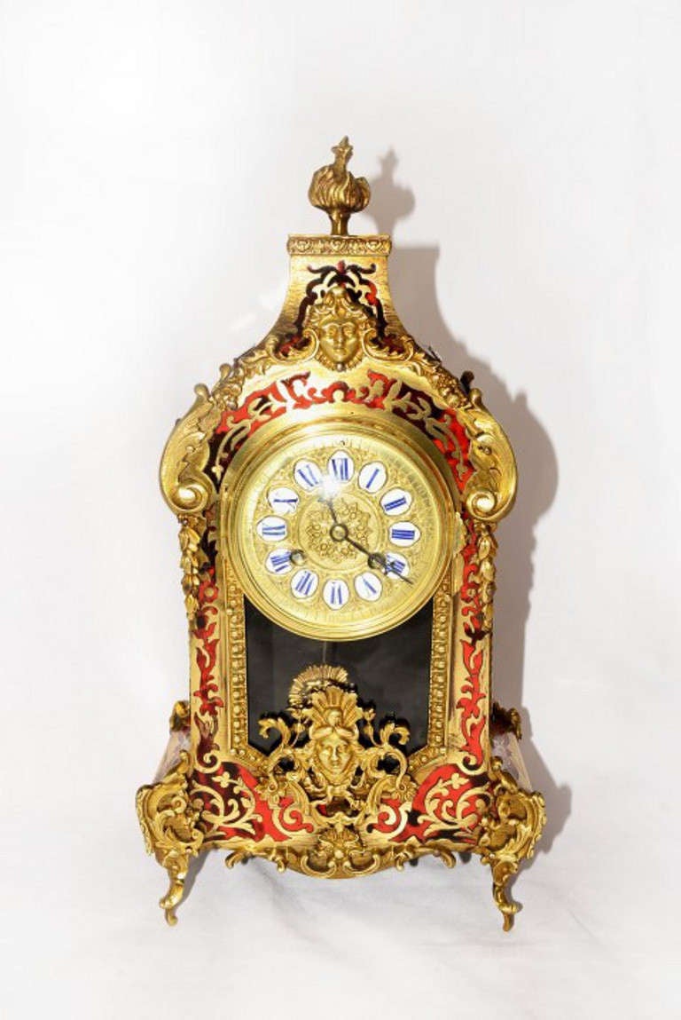 This is a beautiful antique French Boulle mantel clock, Circa 1870 in date. 

The French movement is of high quality and bears the stamp of the well known maker 'H & F Paris'. 

Serial Number: 2805 and pendulum 1359 

The clock has a brass and