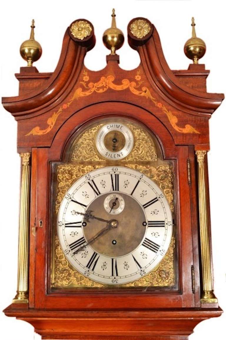 This is a beautiful antique late Victorian, marquetry, mahogany, eight day, musical chiming long-case clock, circa 1880 in date.<br />
<br />
It has an eight-day five pillar movement on an arch dial and chimes on eight bells and five gongs on each