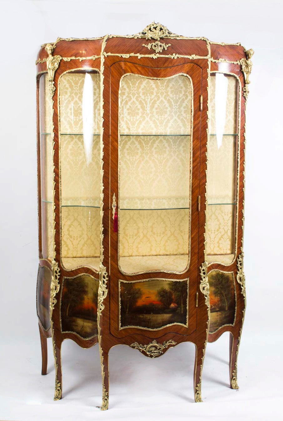 This is an impressive antique French Vernis Martin vitrine in the Louis XV style, circa 1900. The cabinet is made from kingwood and features beautiful hand painted decoration with exquisite ormolu mounts and caryatid. The five panels have been hand