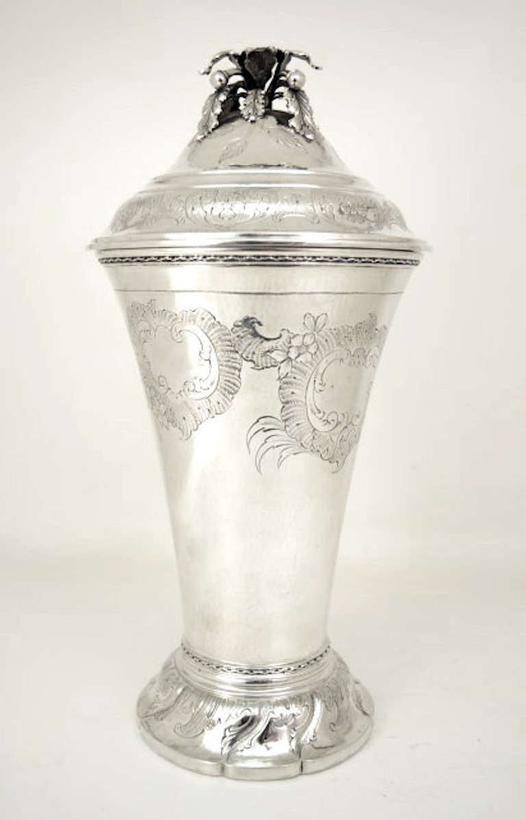 This is a rare and important antique sterling silver cup and cover with hallmarks for the celebrated silversmith Tiffany and with the pattern number 8123 for the year of manufacture 1884.

