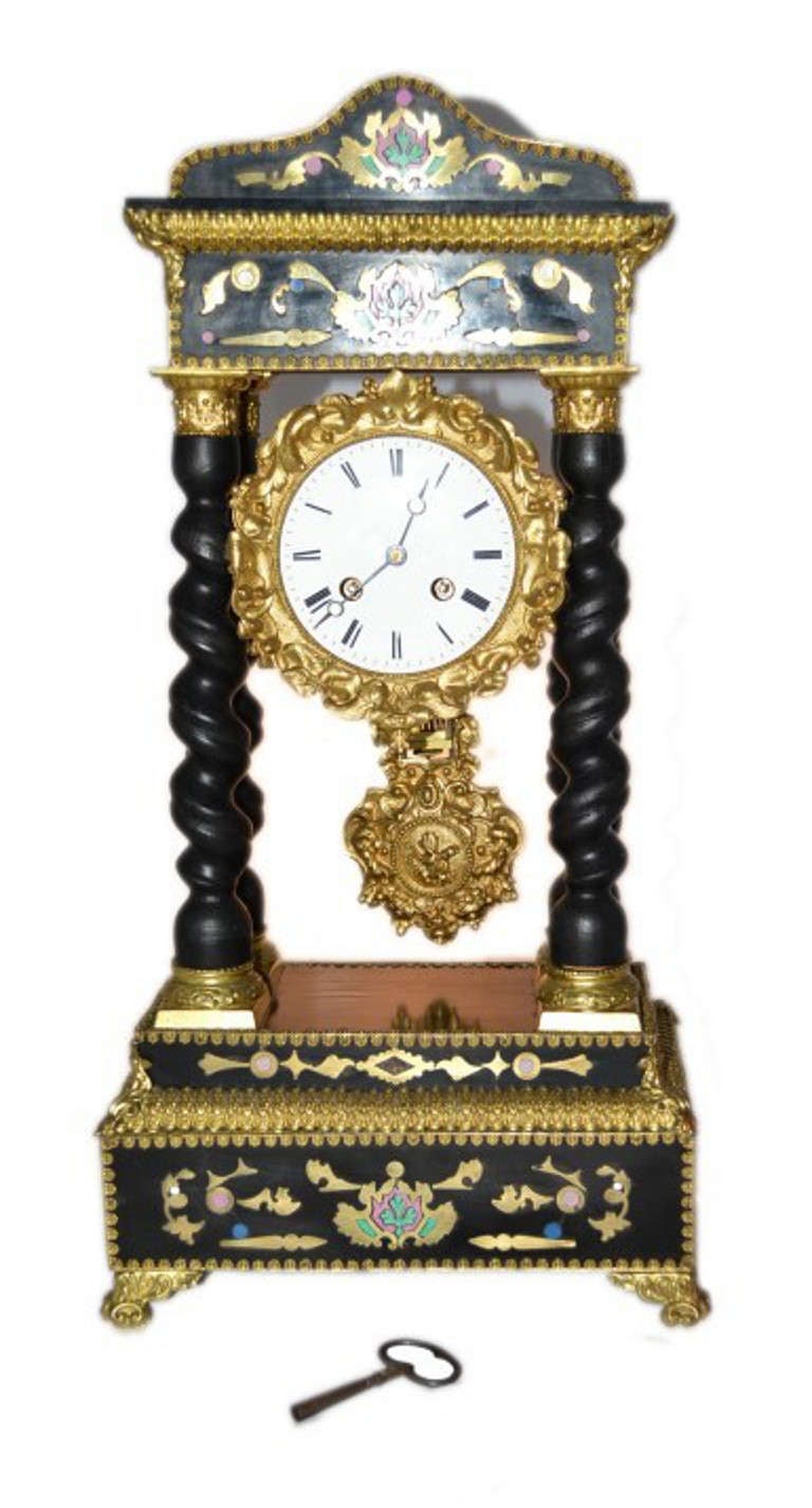 This is a beautiful antique French Napoleon III ormolu and ebonised, Boulle portico mantel clock, Circa 1870 in date, 

The clock is really ornate with fabulous ormolu mounts, wondefrul Boulle decoration and semi precious stones, it has four