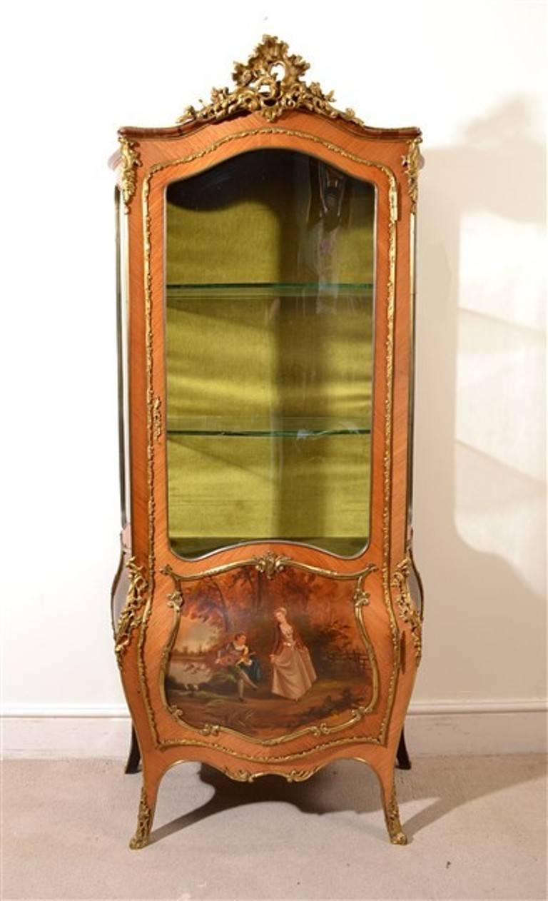 This is a stunning antique French kingwood Vernis Martin vitrine in the Louis XV manner, circa 1880 in date. The base features three hand painted Vernis Martin panels, the central panel is signed by the artist, M Le Brun, who was renowned for