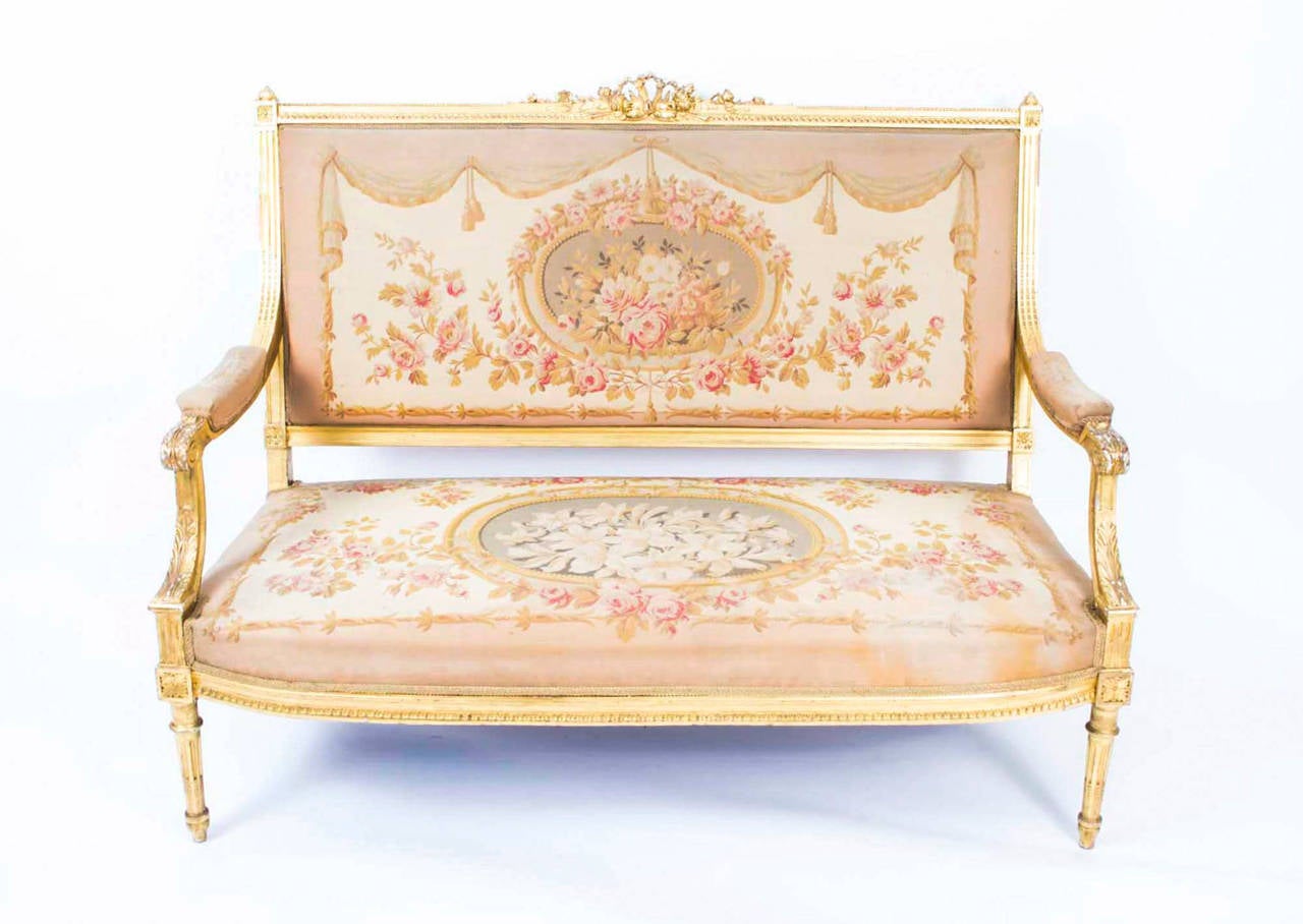 This is a fantastic French Maple and co antique giltwood three piece salon suite, comprising a sofa and a pair of armchairs, Circa 1860 - 1870 in date, the underneath stencilled Maple & Co Ltd 

It has been expertly gilded by a Parisian master
