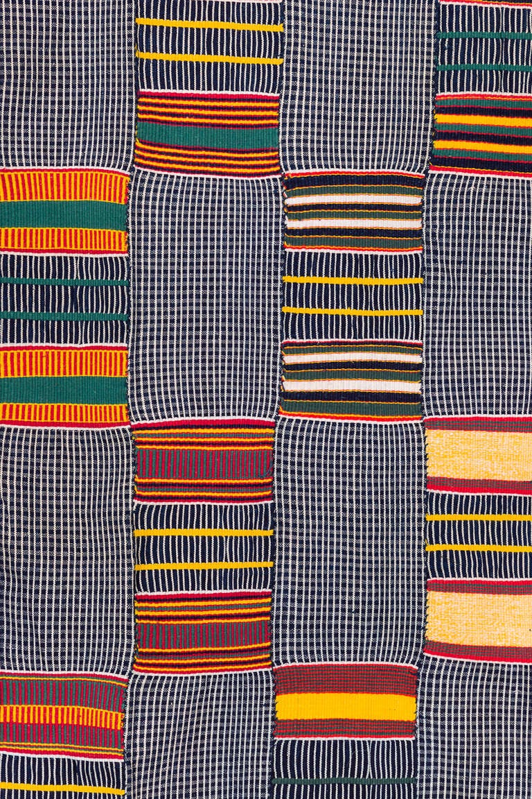 Hand woven cotton and indigo dyed textile with color block design also in cotton 