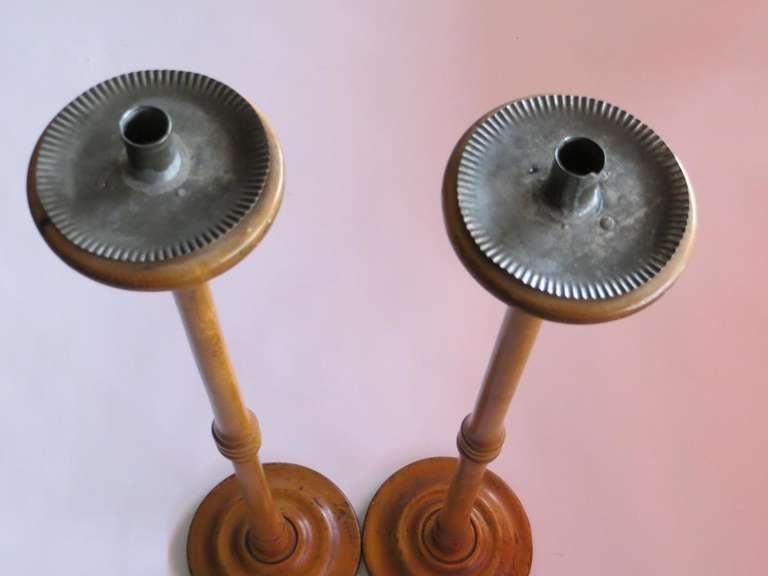 Pair of pine wooden candle stick, probably from an alter with tin candle holders from the 1880's