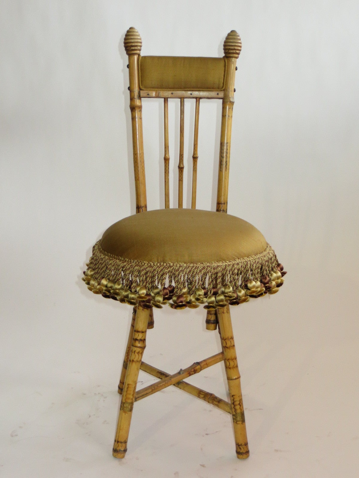 1940's bamboo boudoir chair with silk upholstery and fringe For Sale
