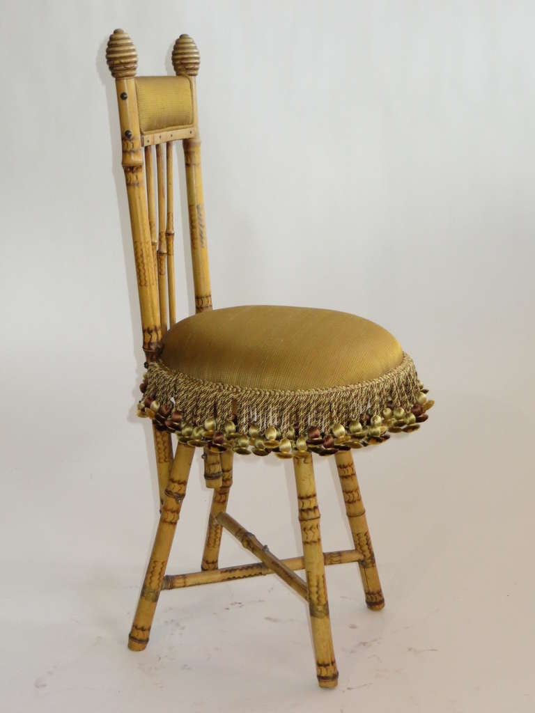 Aesthetic Movement 1940's bamboo boudoir chair with silk upholstery and fringe For Sale