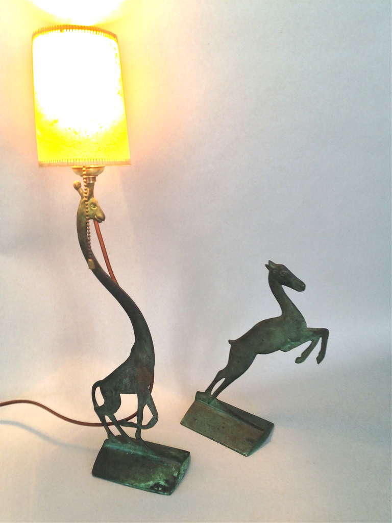 Verdi-gris bronze statuettes by Karl Hagenauer. Graceful, flowing depictions in  cast bronze, with early Deco/ Nouveau styling. Giraffe figure wired for electric, with original electrical fittings, and new cord. Dry, verdigris finish is wonderful.