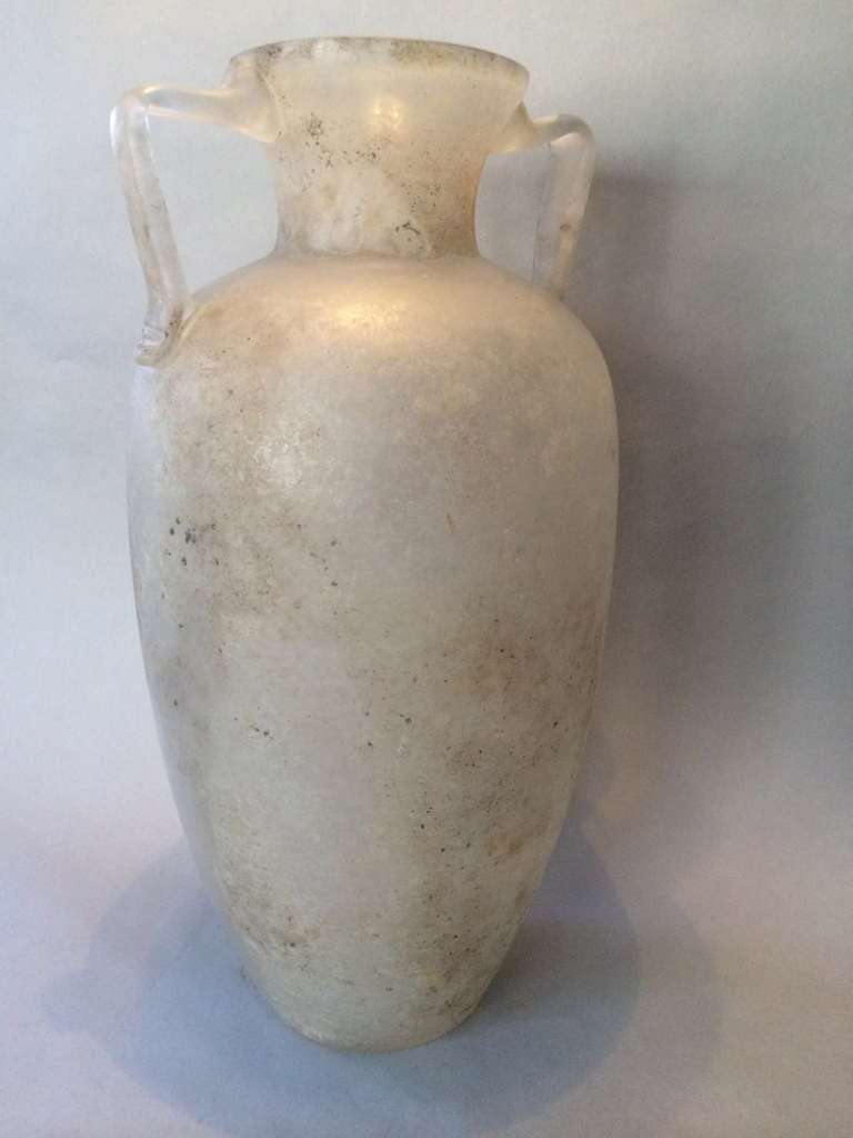 Very Large glass vase, in a kalyx form, modeled after classical Greek antiquity. Molded glass body, with freeblown handles and mottled irridescent finish, with dry, matte surface. This is gorgeous, when the daylight shines through it. !
Unsigned,