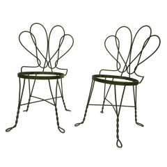 Four Bent Iron Chairs