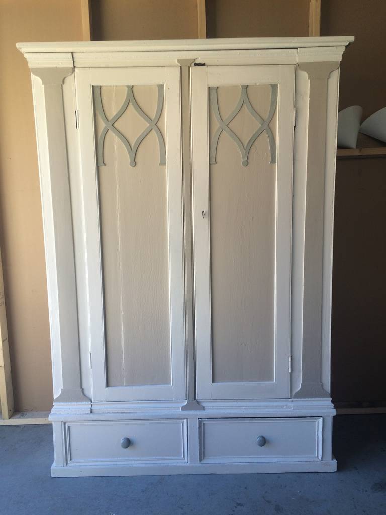 The best piece of folk art furniture I have ever owned. Hand forged hook and eye joinery on the interior allow it to be transported in pieces or reassembled after going through a small or tight doorway. The interior is fitted on the left with a make